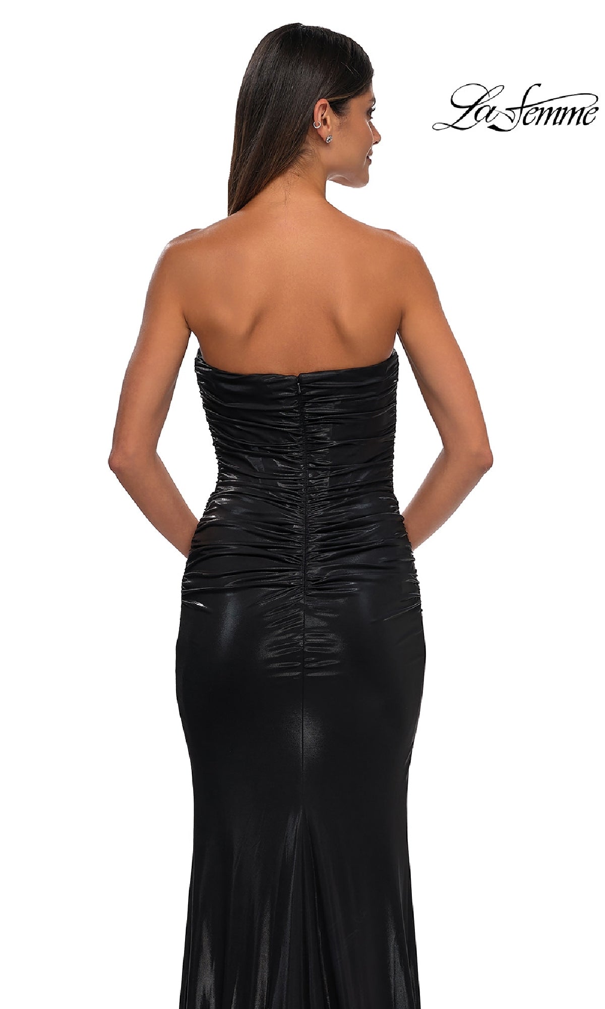 A woman is shown from the back wearing the Long Strapless Tube Prom Dress La Femme 32518, a fitted black satin gown, against a white background with the La Femme logo in the top right corner.